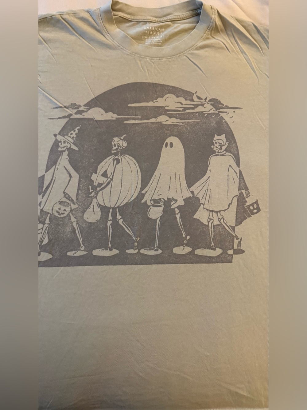 American Eagle Outfitters women’s Light Olive Graphic Halloween T-Shirt